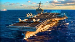 Illustration de l'USS Gerald R. Ford, porte-avions symbolisant la puissance militaire et les avancées technologiques des États-Unis.