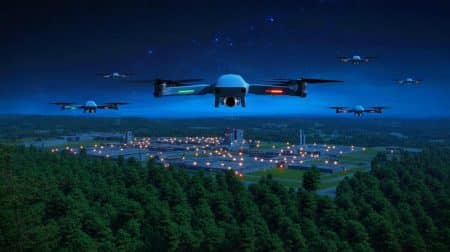 Illustration de drones survolant la base militaire de Karup au Danemark.